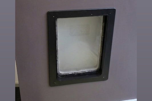 Finished door with the dog door raised 110mm, the epoxy repair invisible under the paint